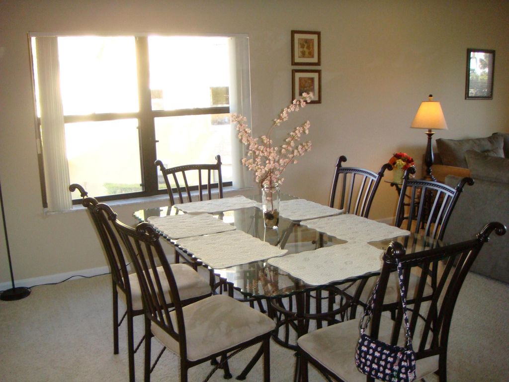 Photo of 200 Uno Lago Drive #201, Juno Beach, FL 33408 (MLS # B26002293)