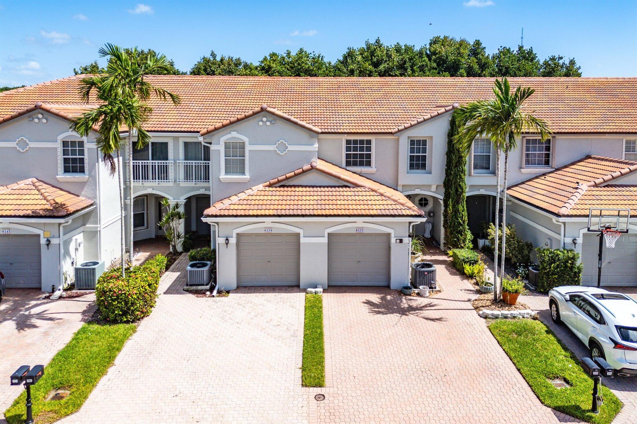 Stunning Casa Sol Model with fantastic updates & features. This 3 bedroom, 2.5 Bath townhome has All Impact Windows/Sliders (2017), Tankless Water Heater (2018) NEW ROOF (2022) Gutters (2023), 3/4'' Thick Glass Railings (2023), New A/C (2024), 1 Car Garage, Water views from your front door & upstairs bedrooms - 1 of only a handful that had a premium lot like this. Eat-in kitchen, 9 ft ceilings, upgraded cabinets, Spacious Living & Dining & Powder & Screened enclosure complete the main floor. 3 Bedrooms upstairs - all with Custom Real California Closets, updated baths. Primary has vaulted ceilings. Full size laundry. Low HOA covers 24/7 Manned Guard gate, Cable, Alarm, Clubhouse with Fitness, Pool, Tennis Playground. A Rated Boca Schools - this has it all. Don't delay -rarely available!