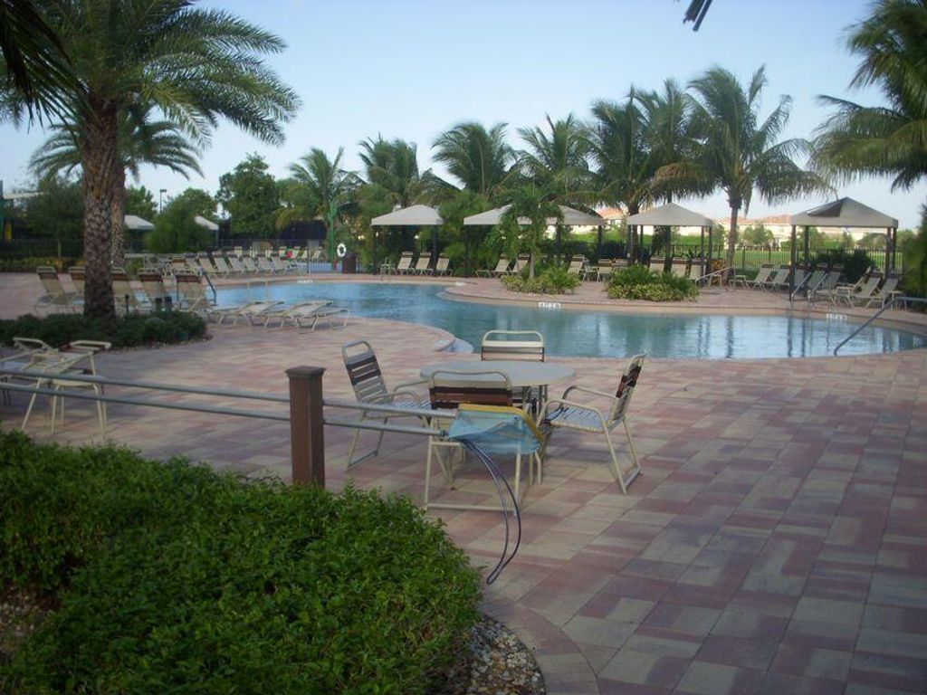 Photo of 8887 Chestnut Ridge Way, Boynton Beach, FL 33473 (MLS # B26011915)