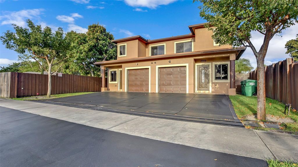 Photo of 1461 SW 40th Ter, Fort Lauderdale, FL 33317 (MLS # F10540500)