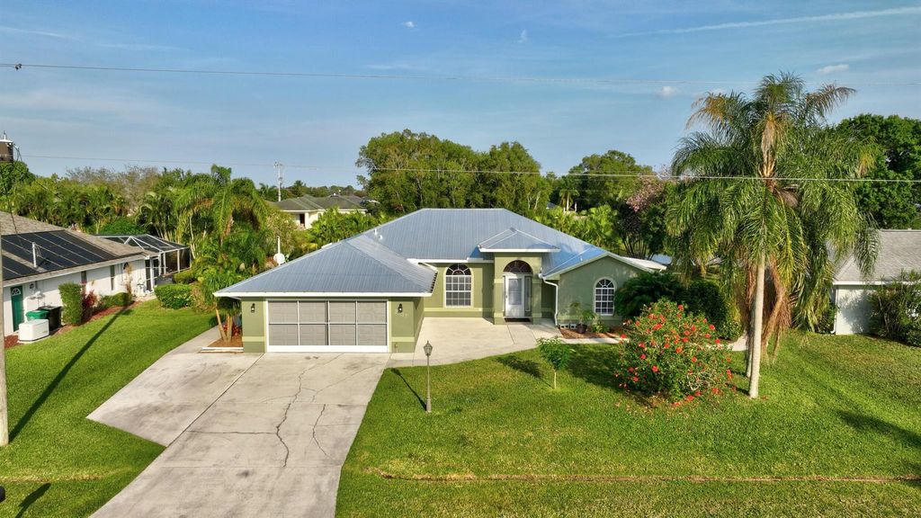 Photo of 2537 SE Hallahan Street, Port Saint Lucie, FL 34952 (MLS # R10968214)