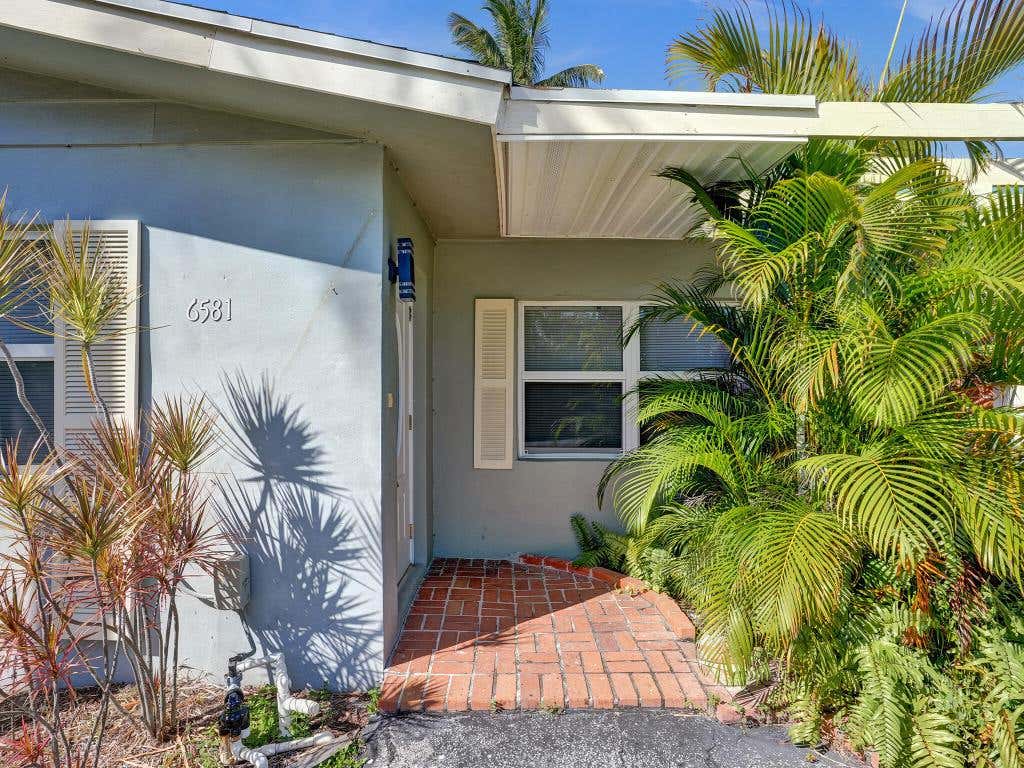 Photo of 6581 NE 7th Avenue, Boca Raton, FL 33487 (MLS # R10934750)