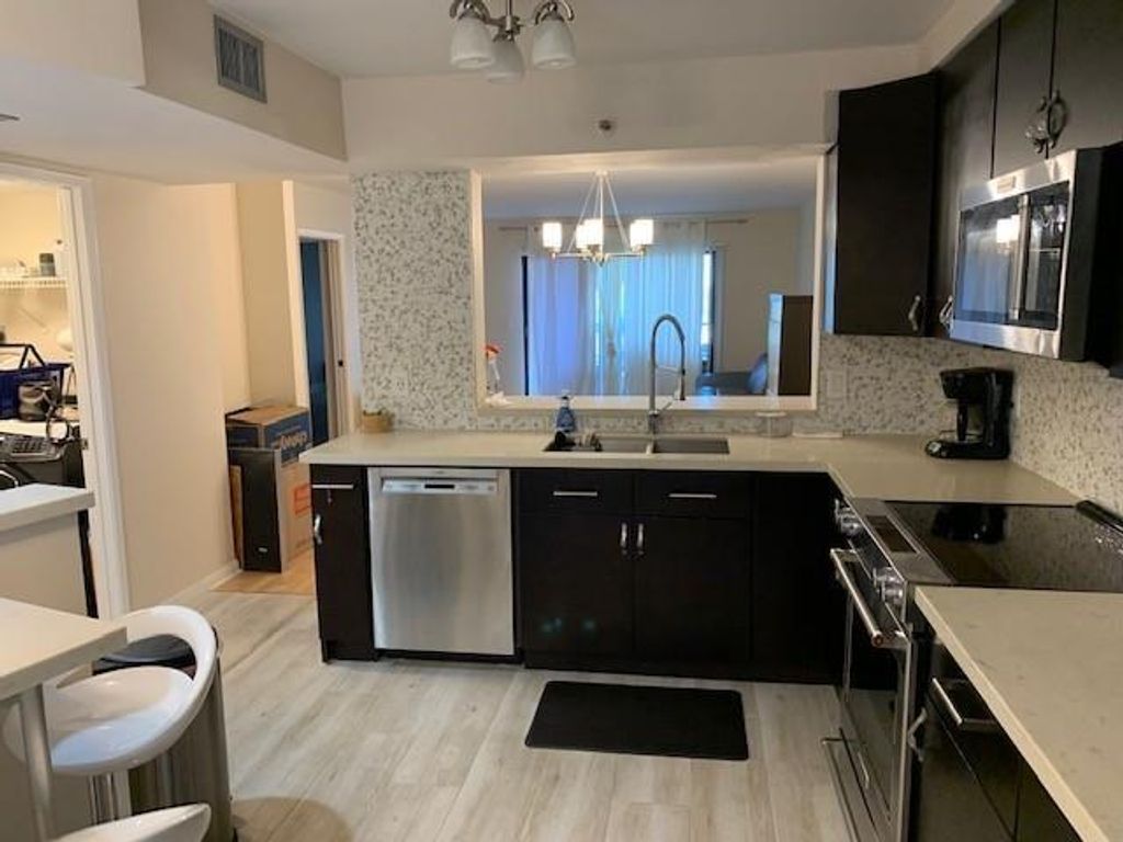 Photo of 2200 S Cypress Bend Drive #905, Pompano Beach, FL 33069 (MLS # F10494408)