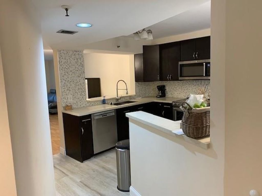 Photo of 2200 S Cypress Bend Drive #905, Pompano Beach, FL 33069 (MLS # F10494408)