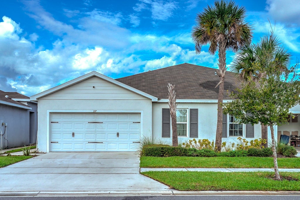 Photo of 337 Raspberry Road, Fort Pierce, FL 34981 (MLS # B26078133)