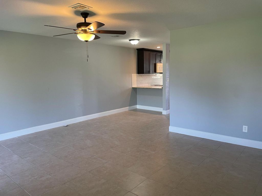 Photo of 5802 Channel Drive, Greenacres, FL 33463 (MLS # R11098088)