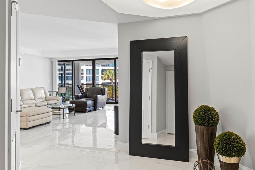 Enjoy spectacular sunrise-to-sunset views from three balconies in this beautifully renovated 2-bedroom, 2.5-bath residence with 2,497 sq ft of living space. This residence offers spectacular Ocean & Intracoastal views and features include 9-ft ceilings, impact glass, porcelain flooring, custom lighting soffits, a chef's kitchen, and elegantly redesigned baths. Offered fully furnished, this turnkey home is located in 3120 South Ocean, a gated boutique oceanfront building with 24-hour doormen, garage parking, fitness center, tennis and pickle ball, a gorgeous pool with towel and beach service, and 16 privately owned boat slips (Not available with this Unit). A rare combination of modern design, comfort, and boutique Palm Beach luxury. ALL CURRENT SPECIAL ASSESSMENTS HAVE BEEN PAID