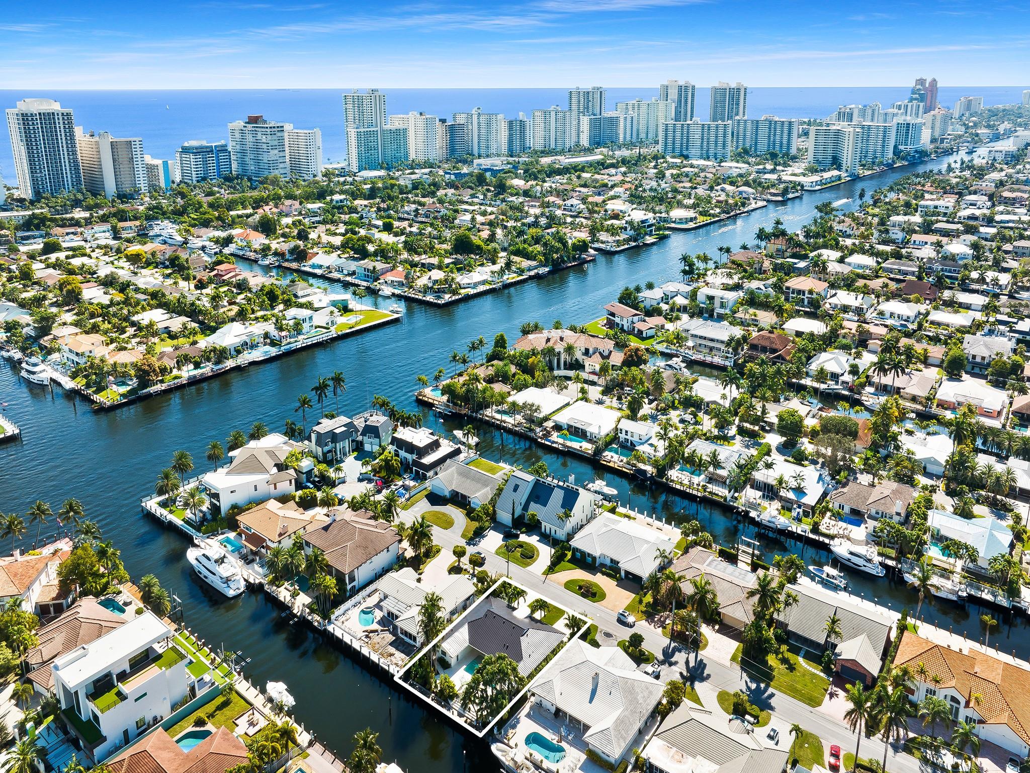 This reimagined waterfront gem in highly desirable Coral Ridge offers 85’ of deepwater access with no fixed bridges Virtually a new build, this single-story residence was designed by award-winning designer Anna Zinkovskaya to perfection. Step into a stunning living space featuring a soaring 14’ pitched ceiling, topped with a brand new metal roof throughout. The chef-inspired kitchen boasts top-of-the-line appliances, while the outdoor space is an entertainer’s dream w/ an XO summer kitchen, shaded Baja shelf/dining space and lush landscaping for privacy, all with breathtaking water views. Luxury finishes include marbles, fixtures & finished closets. Minutes to LBTS, beaches, parks & restaurants, your tropical paradise awaits! 4-month min starting 9/1/25. Furnishings & utilities included.