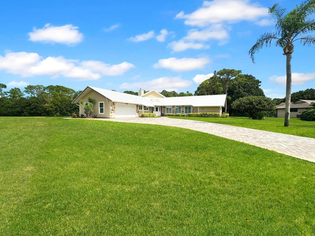 Photo of 4100 Smokey Pines Court, Fort Pierce, FL 34951 (MLS # B26004415)