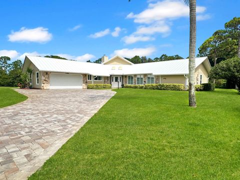 Photo of 4100 Smokey Pines Court, Fort Pierce, FL 34951 (MLS # B26004415)