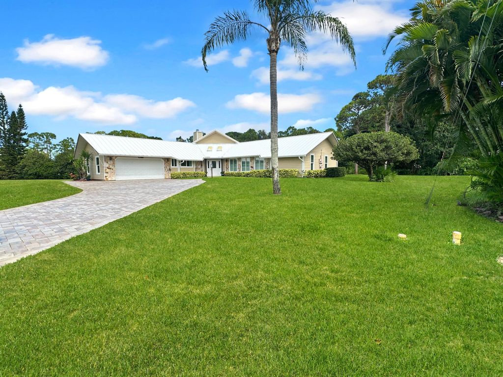 Photo of 4100 Smokey Pines Court, Fort Pierce, FL 34951 (MLS # B26004415)