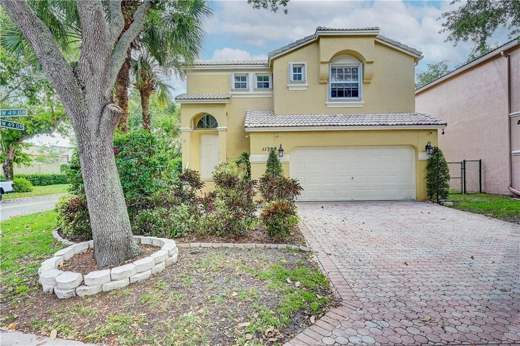 Photo of 11308 NW 49th Dr, Coral Springs, FL 33076 (MLS # F10374085)