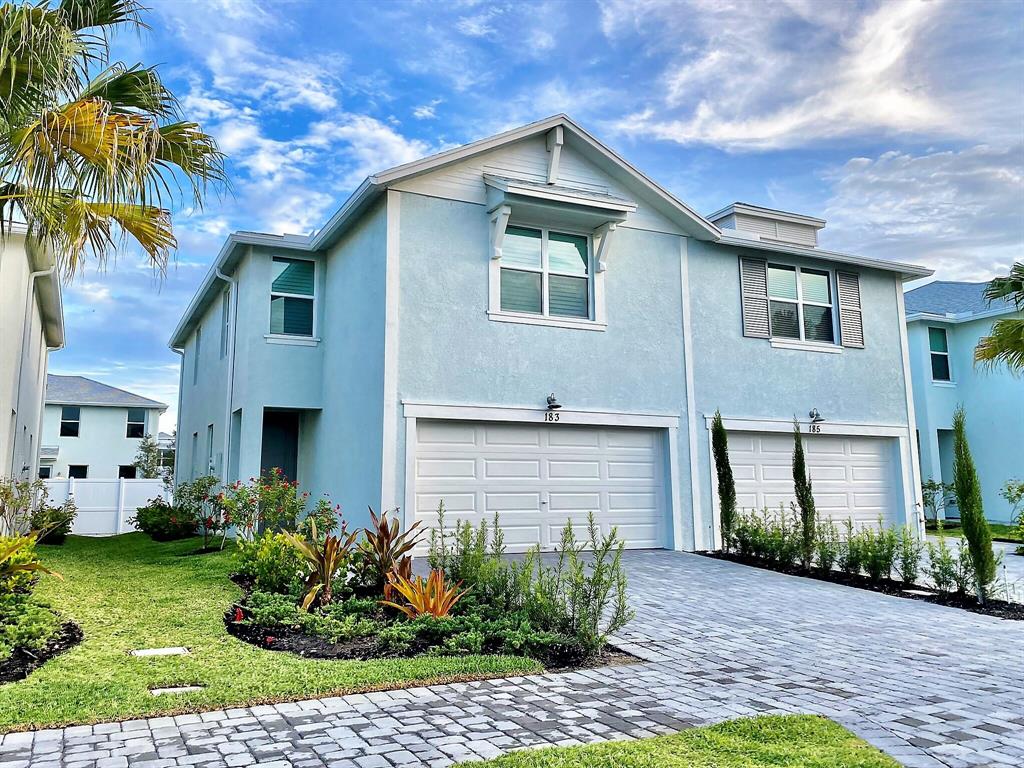 Now Available! Move into this stunning 3 bedroom, 2 1/2 bath, 2 car garage townhome built in 2022 FAST! Awesome location in a brand new gated neighborhood with community pool and cabana just minutes from the Treasure Coast's most beautiful beaches, incredible restaurants, and loads of entertainment in the nearby downtown areas of Stuart and Jensen Beach! Coastal inspired architecture offers the ideal South Florida lifestyle! Well-appointed luxurious kitchen with granite countertops, stainless appliances, and kitchen island with breakfast bar, plush primary suite with walk-in shower, dual vanities, and spacious walk-in closet, hurricane impact windows, plantation shutters and smart features throughout! Welcome home!