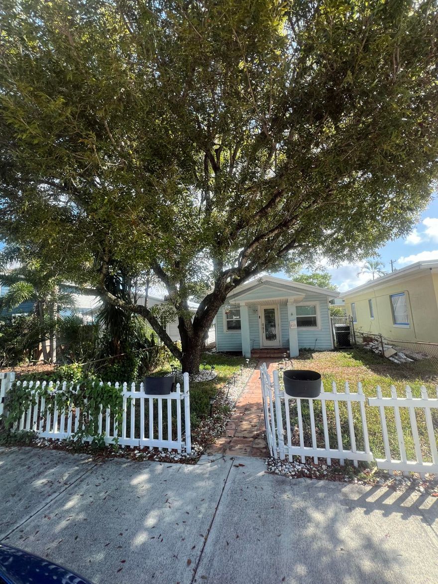 Welcome to this charming and inviting home nestled in a desirable neighborhood of Lake Worth! This well-maintained 4-bedroom, 2-bathroom residence offers the perfect blend of comfort and functionality, ideal for first-time buyers, or anyone seeking a cozy Florida lifestyle. Step inside to find a warm and welcoming living space filled with natural light, creating a relaxing atmosphere throughout. The thoughtfully designed layout maximizes every square foot, offering comfortable bedrooms and a well-appointed bathroom. One of the standout features of this property is the expansive backyard—perfect for entertaining family and friends, hosting weekend barbecues, or creating your own outdoor oasis. Plenty of space for gatherings, pets, or even future additions.