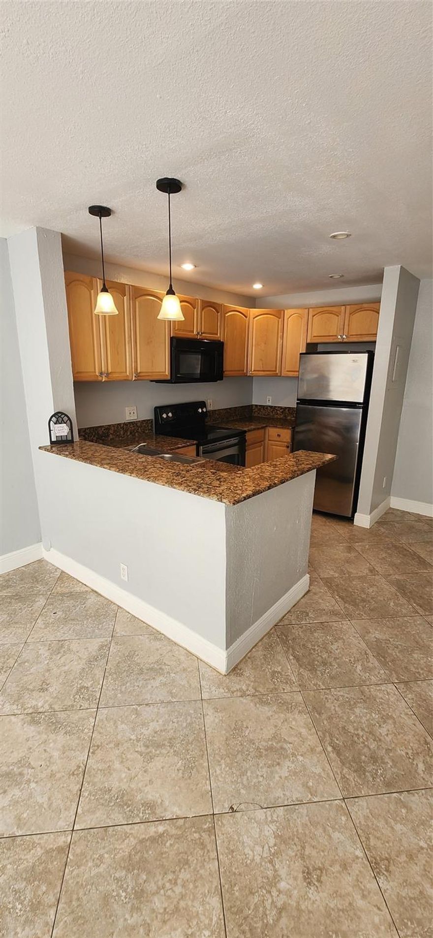 PAY ONLY 2 MONTHS TO MOVE IN, and spread the 3rd month over 6 payments! Excellent Updated 2 Bedrooms & 1 bathroom unit, located in a 1st floor of a nice complex. Tile floors, modern remodeled kitchen, granite counter-top, wood cabinets, washer and dryer inside of the unit, spacious living/Dining Area. Situated in a highly sought-after location, this property offers easy access to the highways, restaurants, and shopping. Condo Application Fee $150 (30 days) or $200 (Rush 3 Business Days) Condo required a minimum credit score of 650. This property is truly 'Move-In-Ready' Don't miss out on the opportunity.