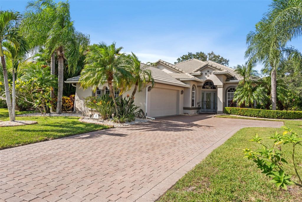 Photo of 1198 NW Mossy Oak Way, Jensen Beach, FL 34957 (MLS # F10531822)