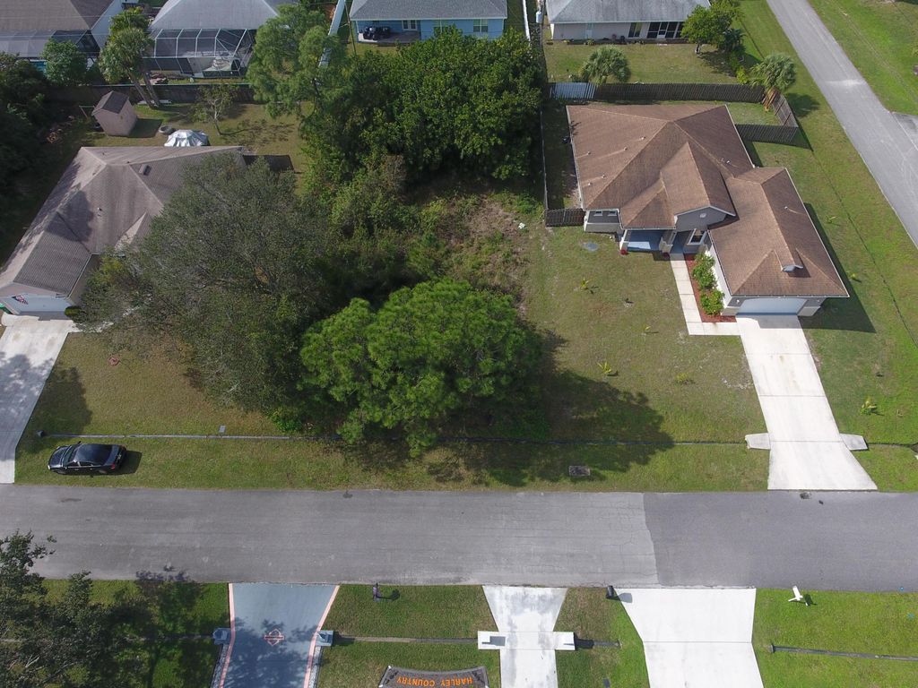 Photo of 3910 SW Laffite Street, Port Saint Lucie, FL 34953 (MLS # R10954238)