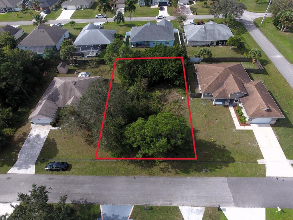 Photo of 3910 SW Laffite Street, Port Saint Lucie, FL 34953 (MLS # R10954238)