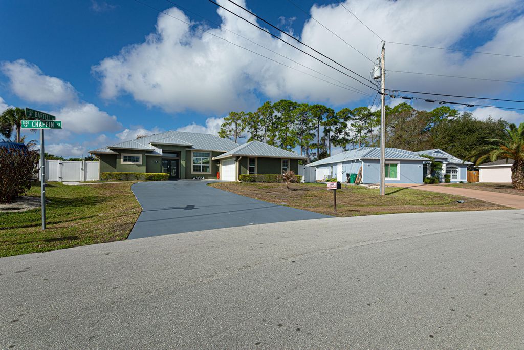 Photo of 3898 SW Chaffin Street, Port Saint Lucie, FL 34953 (MLS # R11169470)