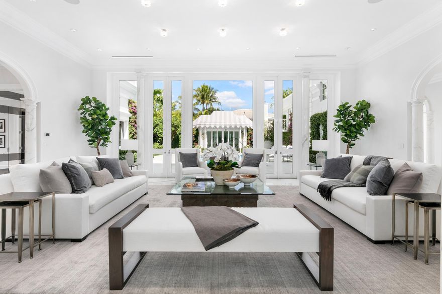 Spectacular Gottfried Regency Estate with 6 bedrooms, 7 full baths, and 1 powder room. Situated on over a half acre, this stunning home features gorgeous eat-in kitchen, formal dining room, library with bar, and expansive first floor Owner's Suite. Light and bright formal living room with floor-to-ceiling windows opens to serene pool area. Recently renovated with beautiful finishes throughout. Additional highlights include high ceilings, meticulously landscaped grounds, 3-car garage, pool cabana, and full house generator. Property is currently being subdivided. Listing is for the eastern portion of the parcel.