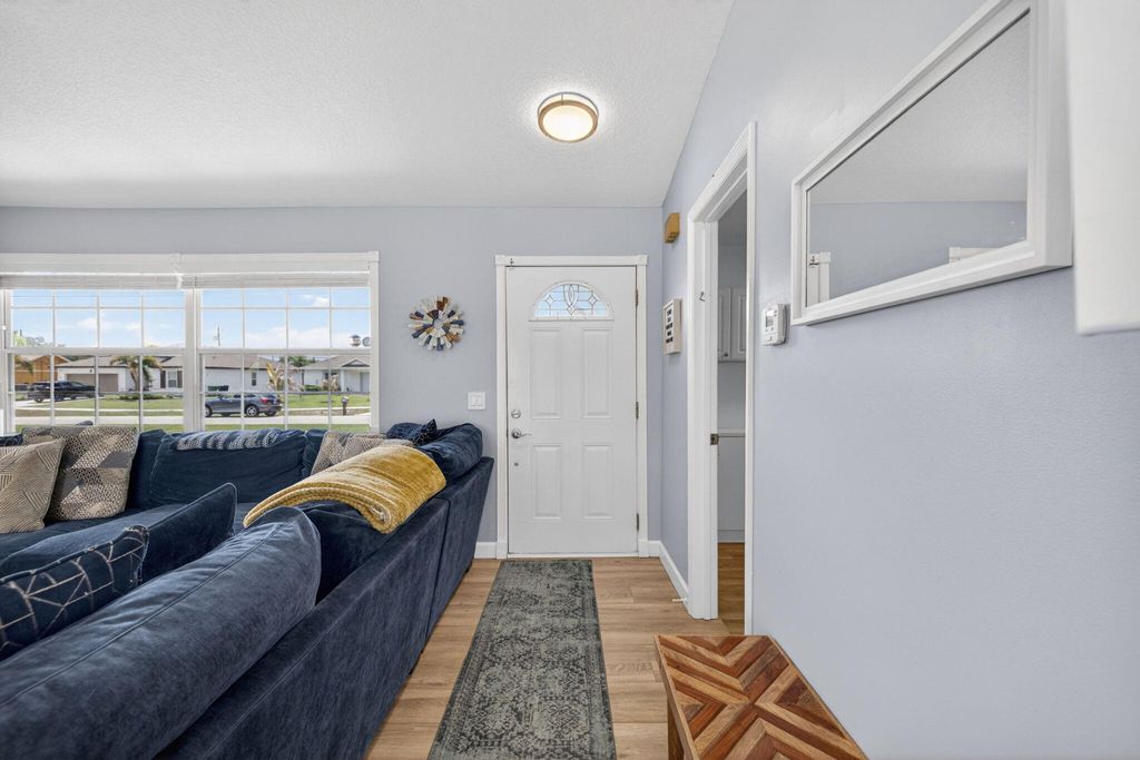 Photo of 1031 SW Idol Avenue, Port Saint Lucie, FL 34953 (MLS # B26026405)