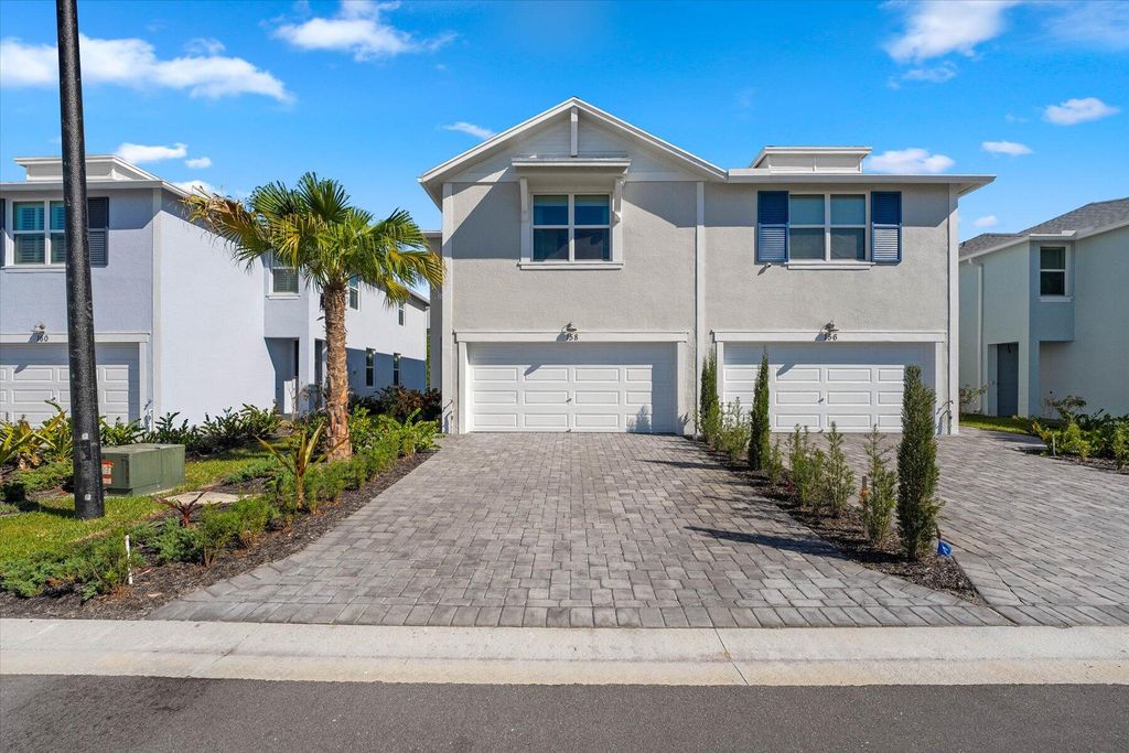 Photo of 158 Osprey Preserve Boulevard, Jensen Beach, FL 34957 (MLS # R10955751)