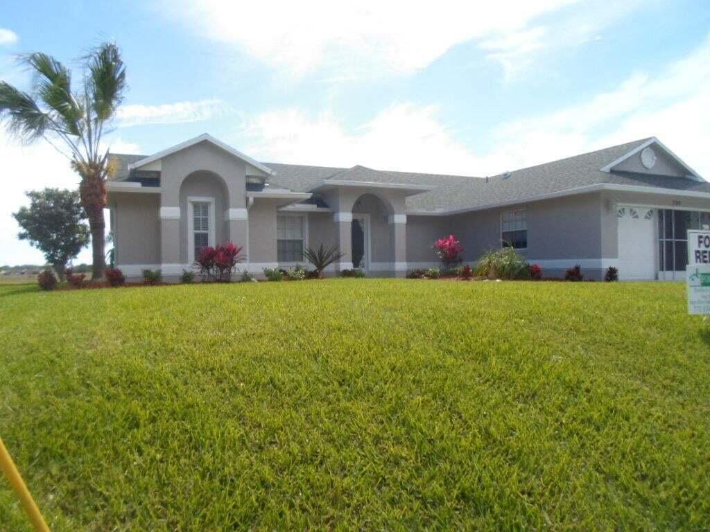 Photo of 790 SW College Park Road, Port Saint Lucie, FL 34953 (MLS # R11039607)