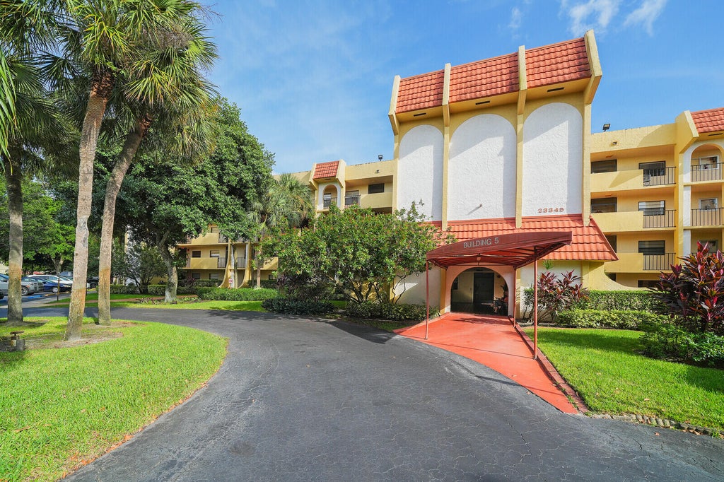 Photo of 23345 Carolwood Lane #406, Boca Raton, FL 33428 (MLS # B26078228)