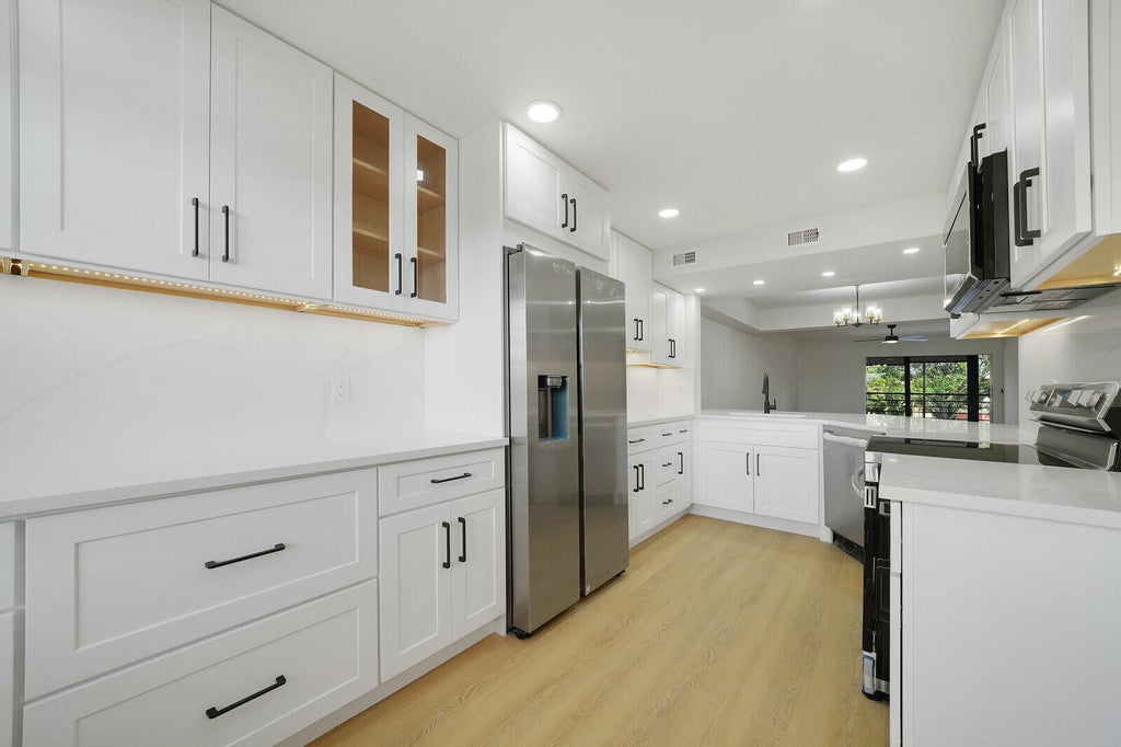 Photo of 23345 Carolwood Lane #406, Boca Raton, FL 33428 (MLS # B26078228)