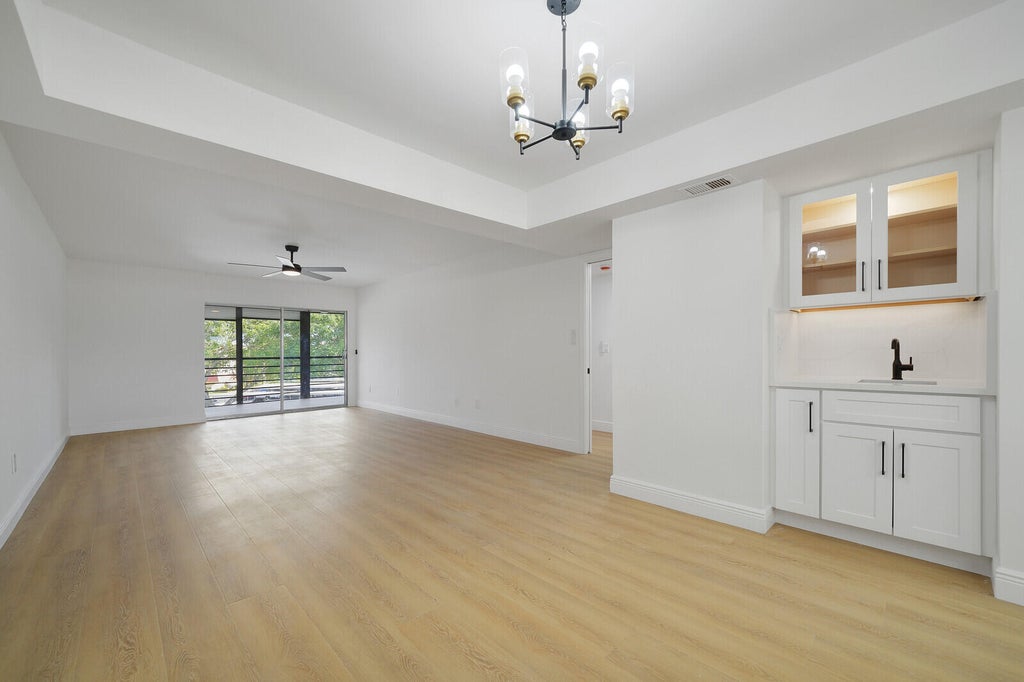Photo of 23345 Carolwood Lane #406, Boca Raton, FL 33428 (MLS # B26078228)