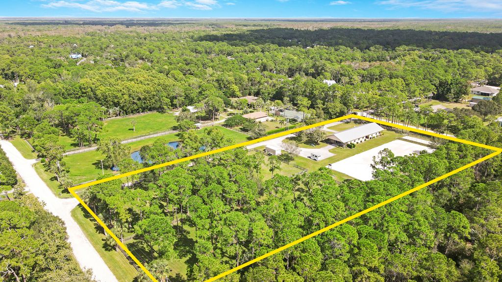Photo of 18480 Windsong Way, Jupiter, FL 33478 (MLS # R10930561)
