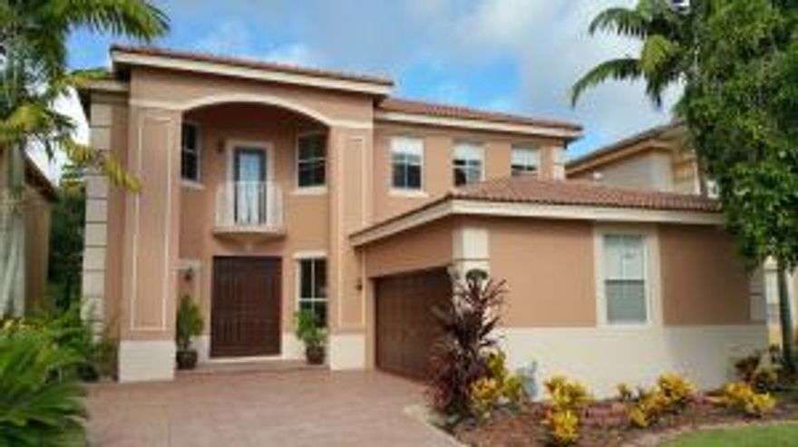 Beautiful 4 Bedroom, 3 1/2 Bath Huge house on canal with large paved patio, Huge Master Bedroom and family room, High ceilings in living room, Wood flooring in the bedrooms and Tile everywhere else, Wood cabinets in big kitchen, Double door entry, freshly painted and well maintained by the owners. Owner will split the association application fee of $500 for qualified applicant.