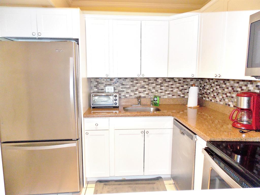 SNUG HARBOR GARDENS CONDO - Residential