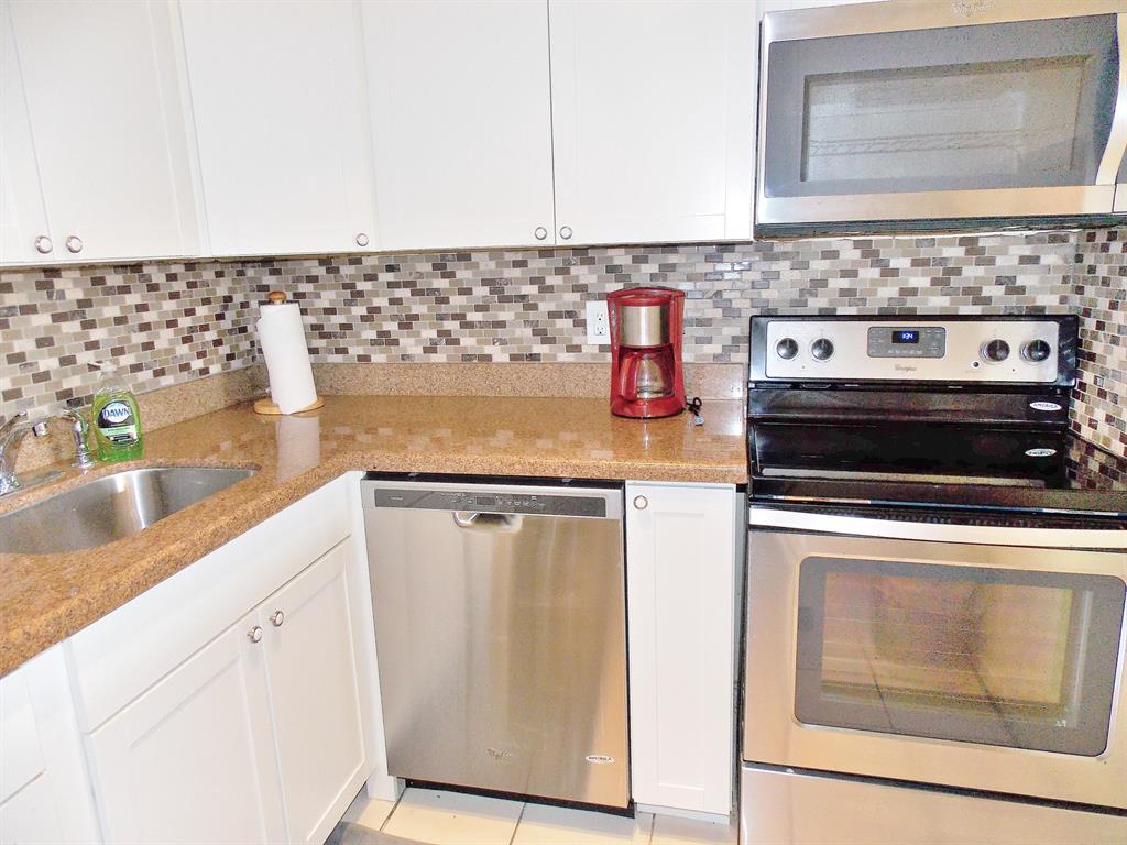 SNUG HARBOR GARDENS CONDO - Residential