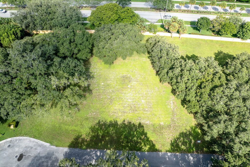 Photo of 9900 Winding Rdg Lane, Davie, FL 33324 (MLS # B26008897)