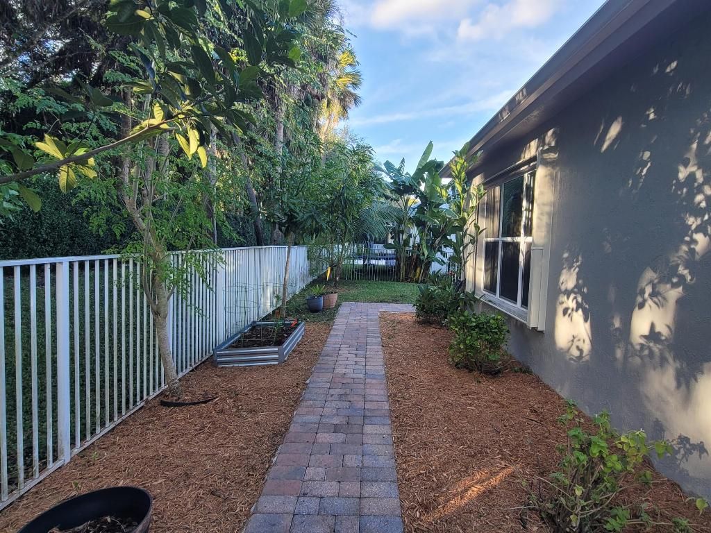Photo of 9335 Plantation Estates Drive, West Palm Beach, FL 33411 (MLS # R11148415)
