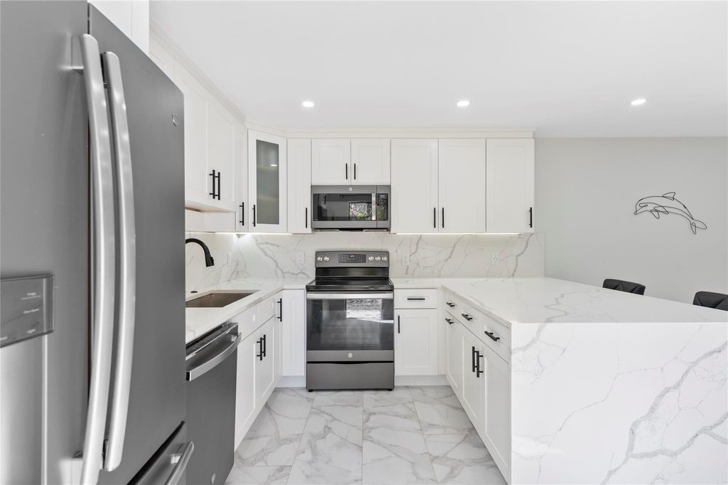 Photo of 3428 San Bernadino Drive #58-A, Delray Beach, FL 33445 (MLS # F10415796)