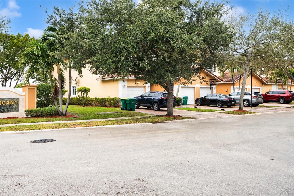 Photo of 5722 Tuscany Terrace, Tamarac, FL 33321 (MLS # F10549398)