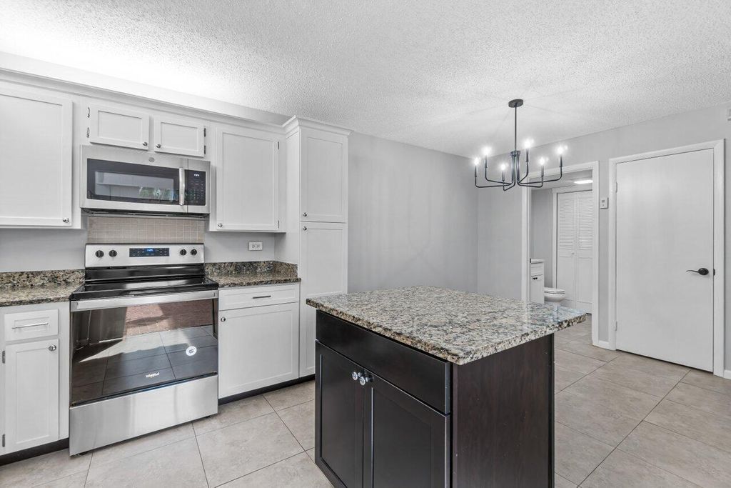 Photo of 2412 24th Lane, Palm Beach Gardens, FL 33418 (MLS # R10964987)