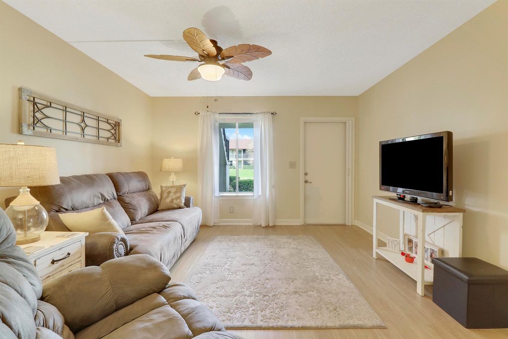 Photo of 6299 Chasewood Dr #C, Jupiter, FL 33458 (MLS # R10955401)