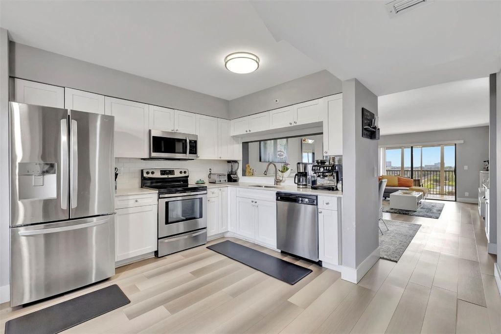 Photo of 2200 S Cypress Bend Drive #702, Pompano Beach, FL 33069 (MLS # F10507252)