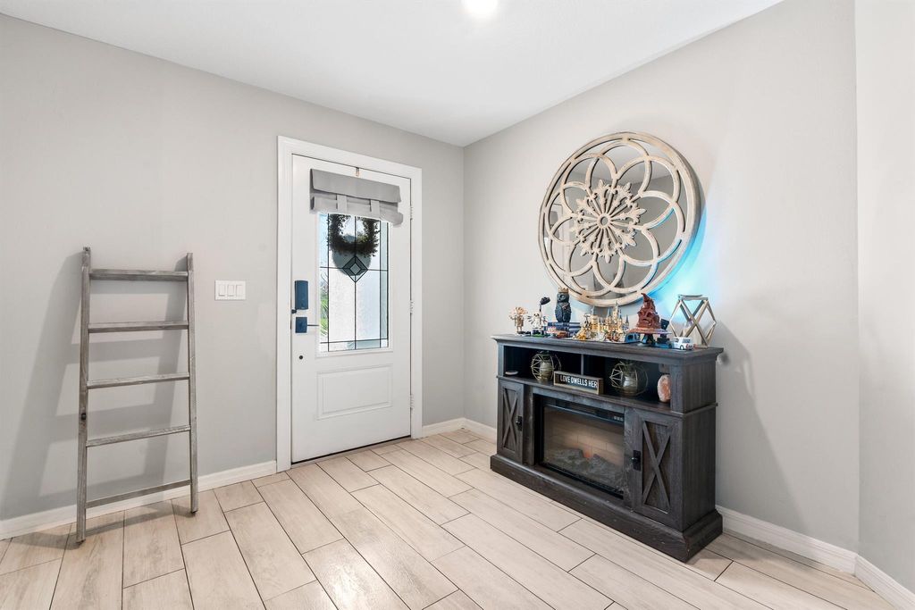 Photo of 885 SW Squirrel Avenue, Port Saint Lucie, FL 34953 (MLS # R11084222)