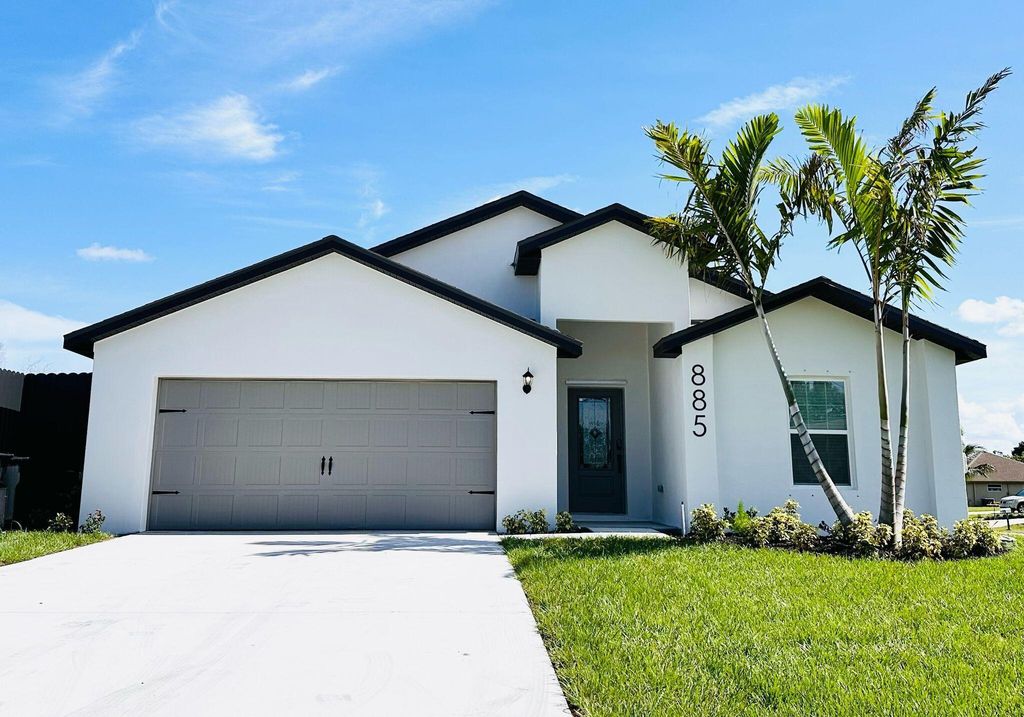Photo of 885 SW Squirrel Avenue, Port Saint Lucie, FL 34953 (MLS # R11084222)
