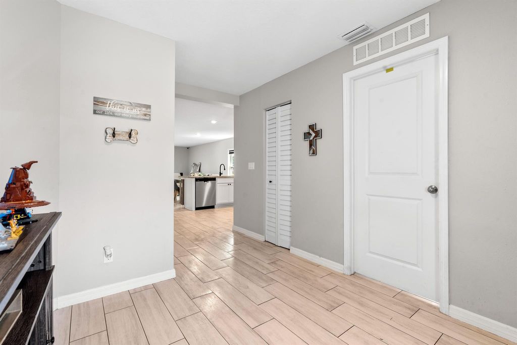 Photo of 885 SW Squirrel Avenue, Port Saint Lucie, FL 34953 (MLS # R11084222)