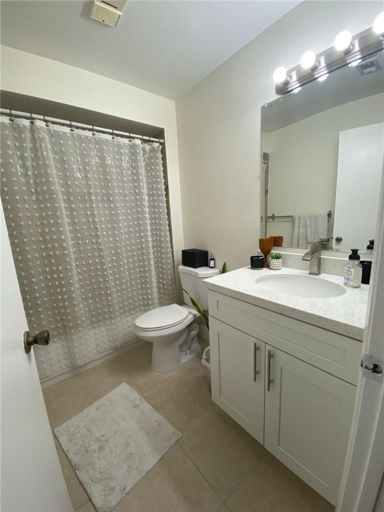 Photo of 9999 SUMMERBREEZE Drive #206, Sunrise, FL 33322 (MLS # B26068555)