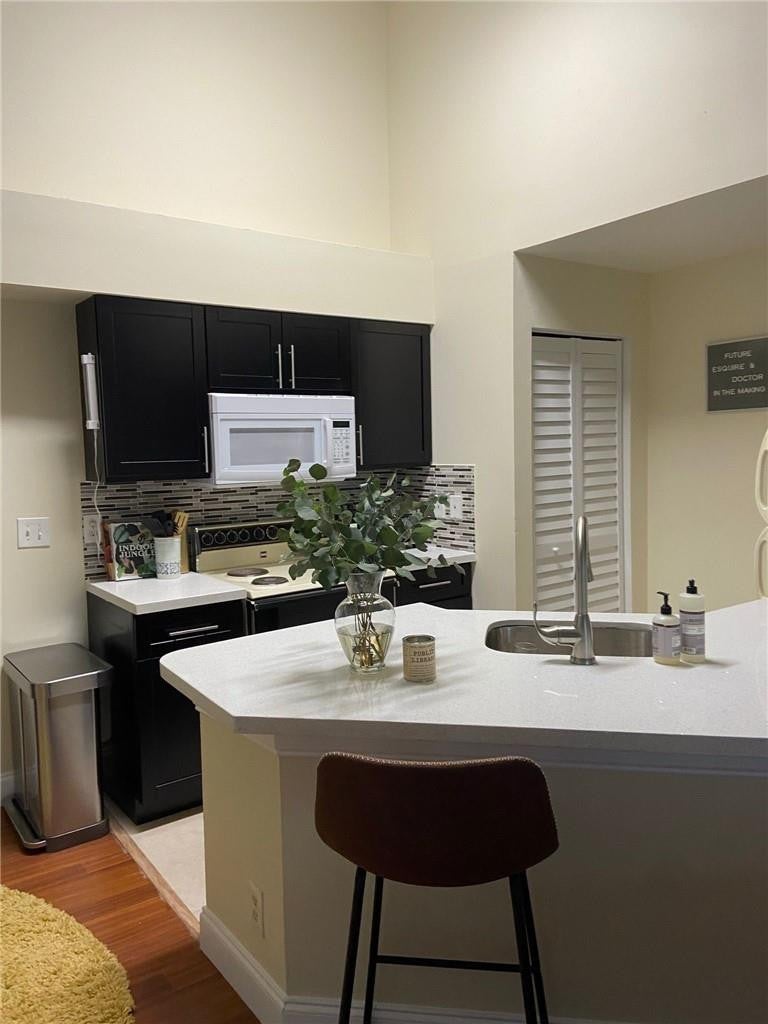 Photo of 9999 SUMMERBREEZE Drive #206, Sunrise, FL 33322 (MLS # B26068555)