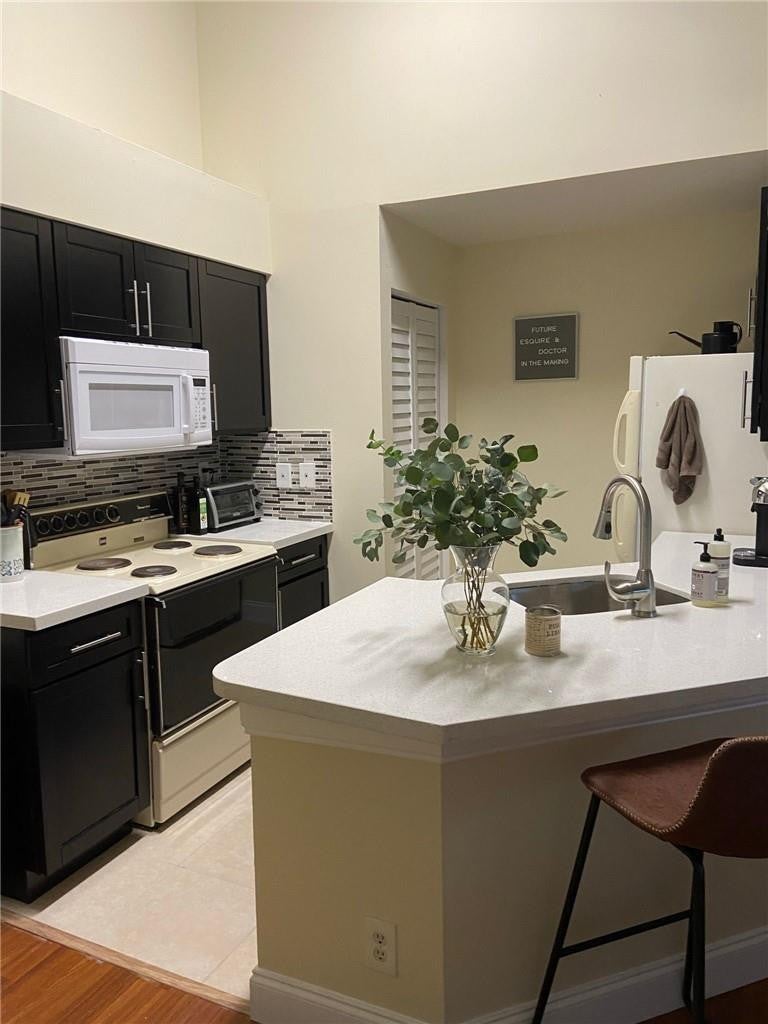 Photo of 9999 SUMMERBREEZE Drive #206, Sunrise, FL 33322 (MLS # B26068555)
