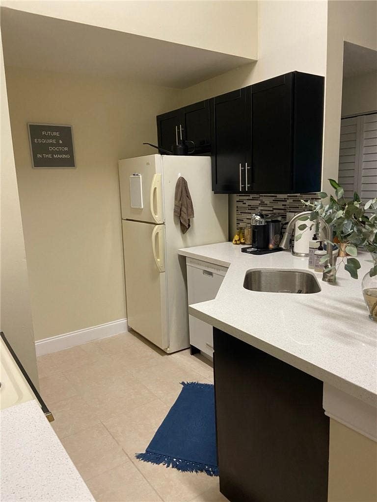 Photo of 9999 SUMMERBREEZE Drive #206, Sunrise, FL 33322 (MLS # B26068555)