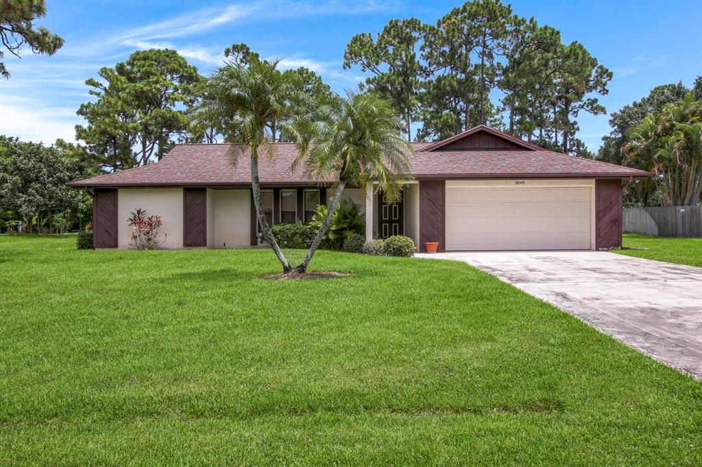 Photo of 2649 SE Carthage Road Rd, Port Saint Lucie, FL 34952 (MLS # R10826857)