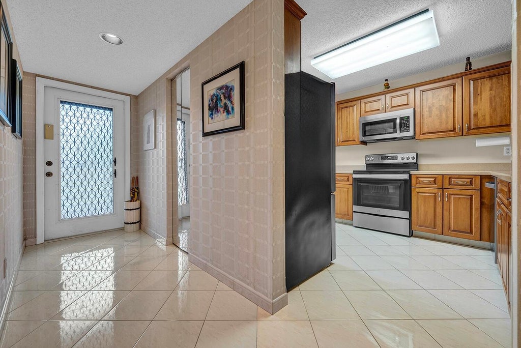 Photo of 15074 WITNEY Road #205, Delray Beach, FL 33484 (MLS # B26079204)